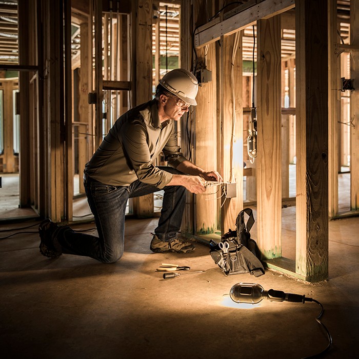 Electrician at home construction site.
