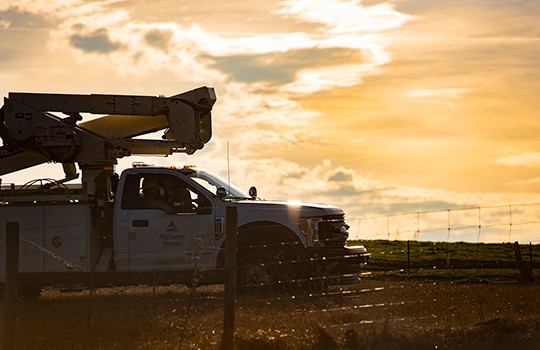 Alabama bucket truck in the field