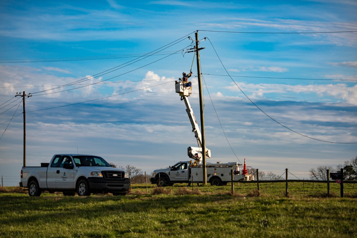 Fleet of Alabama Power Utility Trucks on a street