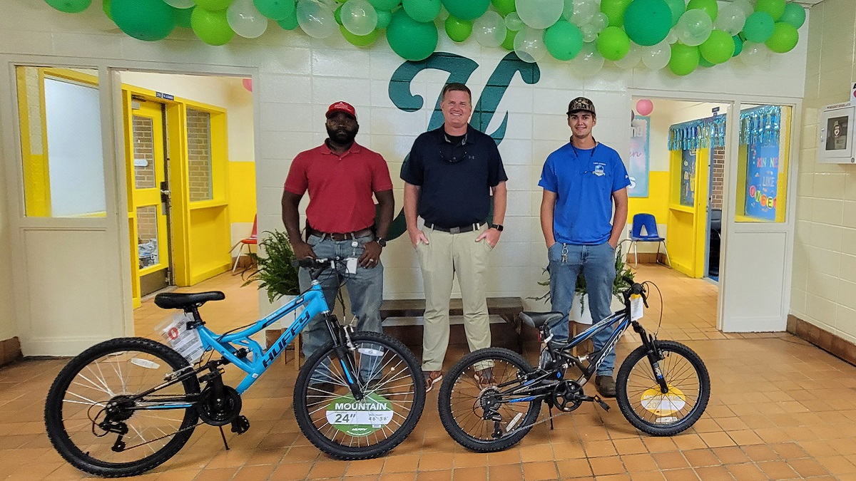 Jordan Dam team donating bikes for Holtville Elementary.