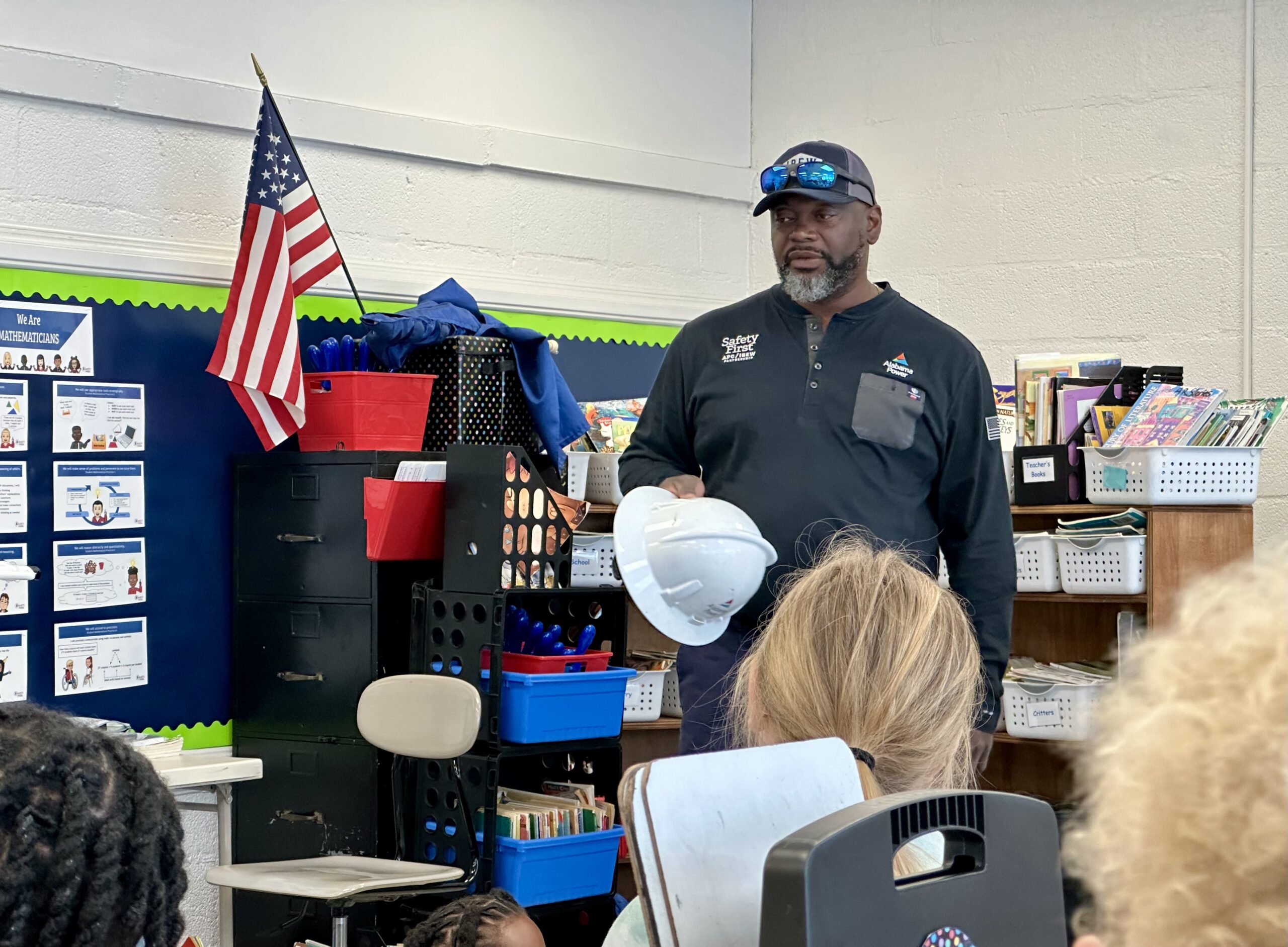 Alabama Power lineman Marquis Marbury returned to his old elementary school to deliver a message about weather awareness and safety.