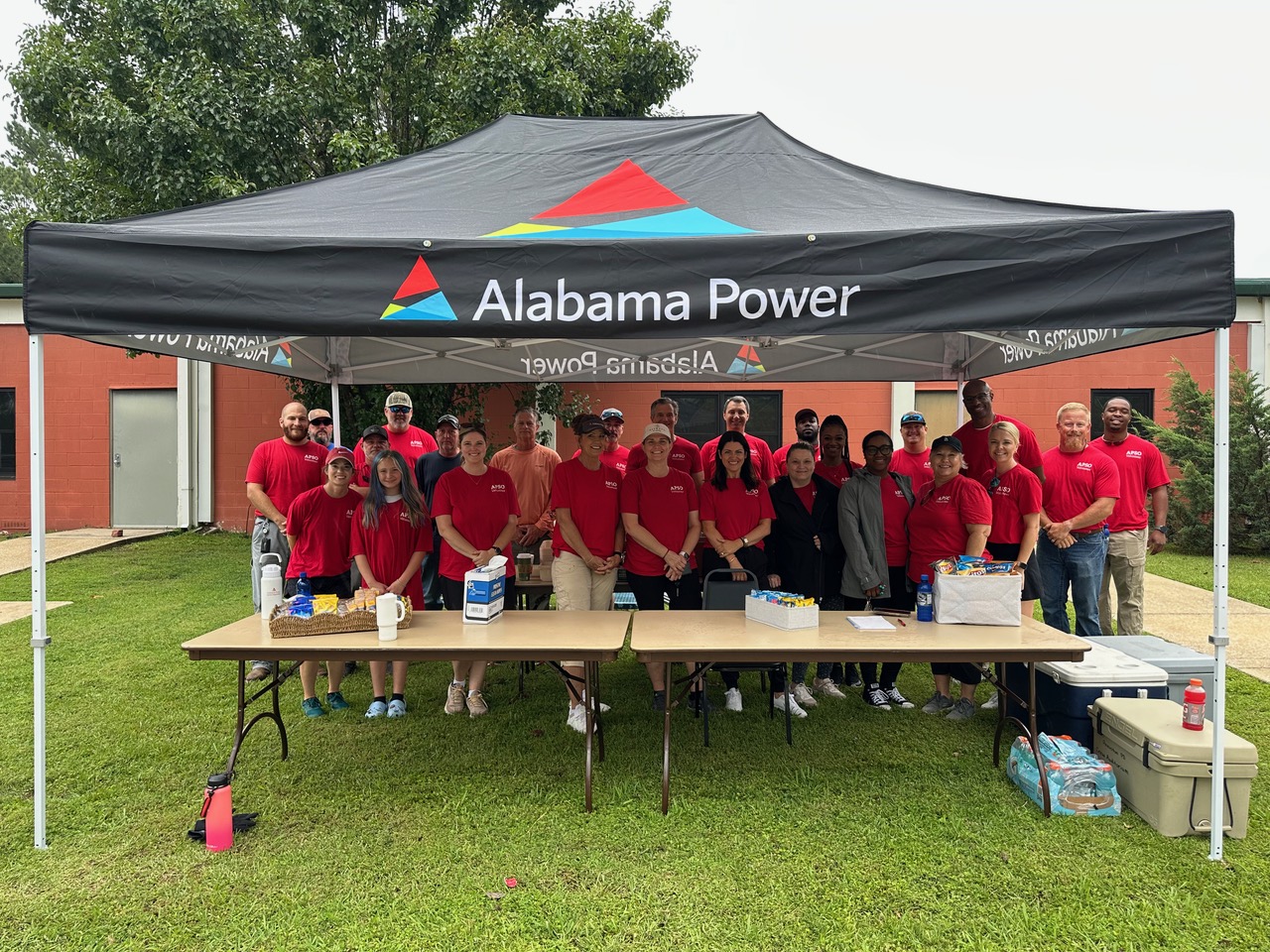 About 40 volunteers from the Alabama Power Service Organization painted and landscaped the outside of the ECAUCP building in Anniston.