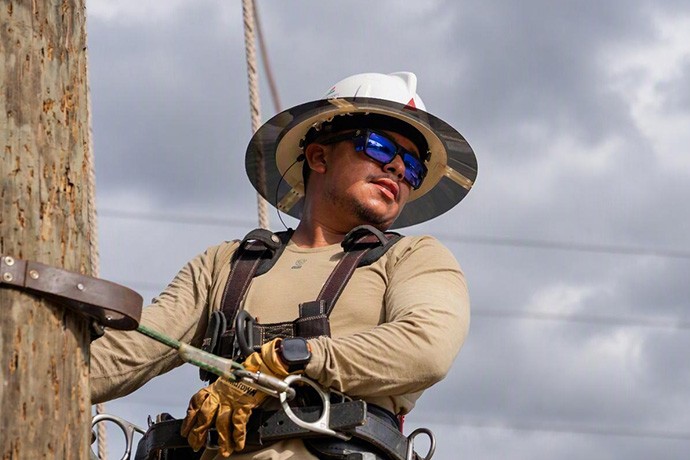 lineworker restoring power