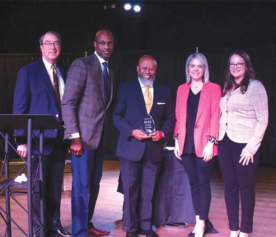 From left, past chamber chair Wilbur Masters, with Alabama Power’s Terry Smiley, Tony Smith and Jacki Lowry, and chamber President and CEO Christi Robinson at the presentation of the Joanne Hightower Community Impact Award. (contributed)